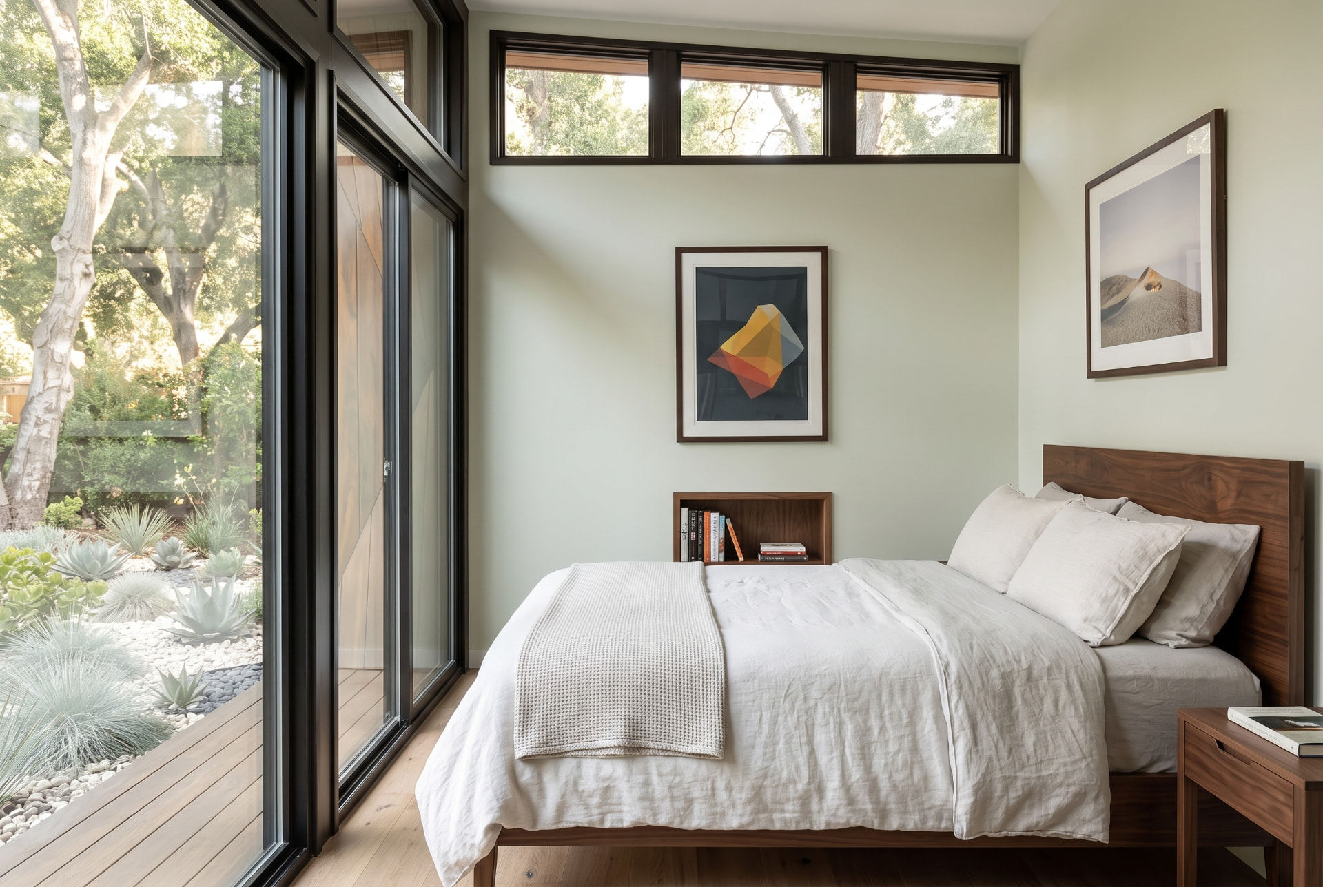 Palo Alto backyard studio sleeping area beside full-height garden glazing
