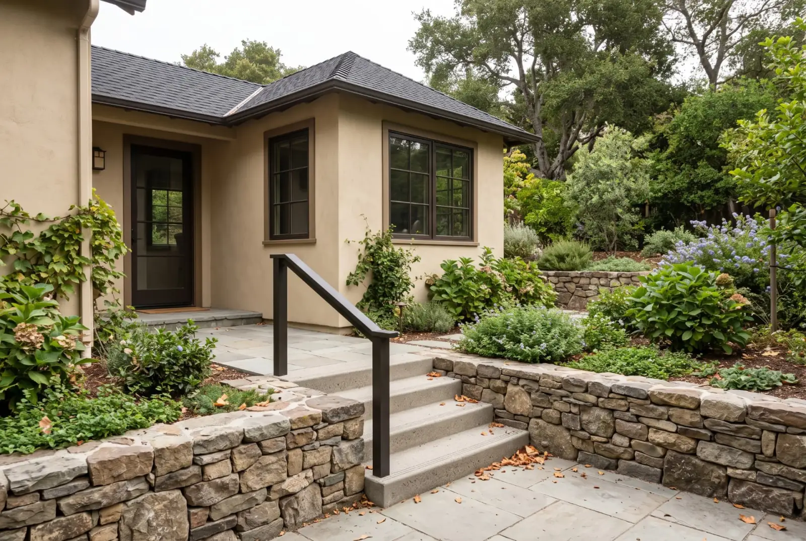 Illustrative ADU beside a terraced garden, with coordinated landing, steps, and low retaining walls.